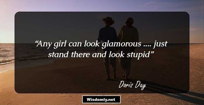 Any girl can look glamorous .... just stand there and look stupid